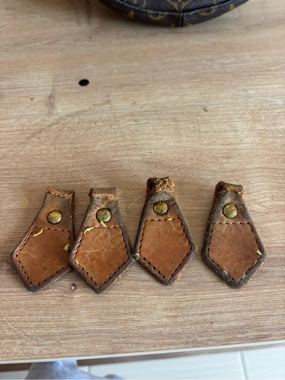 Authentic Louis Vuitton rivets and leather tabs